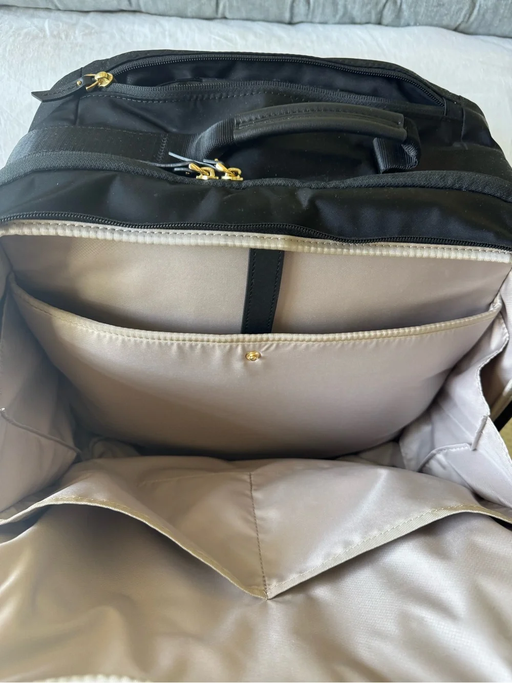 Tumi Black Travel Carry-On with Gold Hardware
